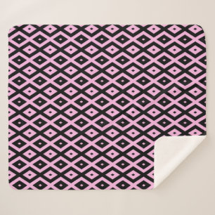 Pale pink and black diamond pattern sherpa blanket