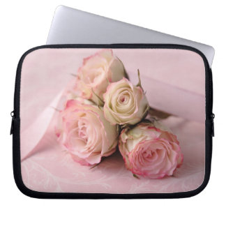 pale roses on pink swirls laptop sleeve