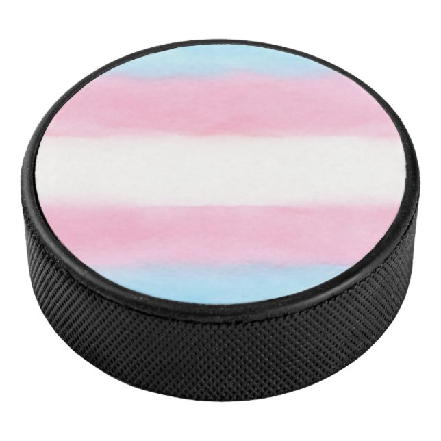 pale trans flag design on hockey puck (3/4)