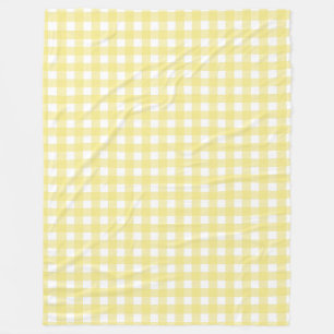 Pale yellow and white gingham fleece blanket