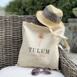 Palm Frond Destination Wedding Welcome Tote Bag<br><div class="desc">Welcome guests to your destination wedding with these chic and modern personalised tote bags. Design features a coral palm frond illustration with your wedding destination beneath (shown with Tulum) in classic serif lettering. Add your names beneath in handwritten cursive script, as well as the year. Colours can be changed to...</div>