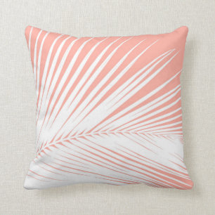 Palm leaf - white on coral pink cushion