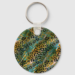Palm leaves on a leopard background. key ring