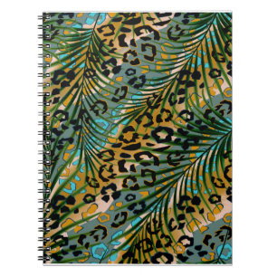 Palm leaves on a leopard background. notebook