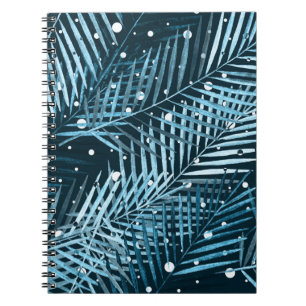 Palm leaves on blue with white polka dots. notebook