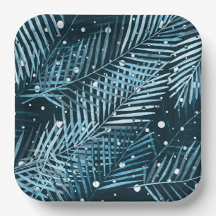 Palm leaves on blue with white polka dots. paper plate