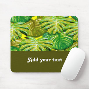 Palm leaves on yellow mouse mat