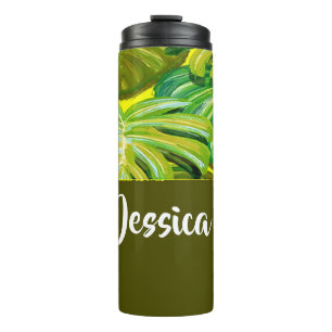 Palm leaves on yellow thermal tumbler