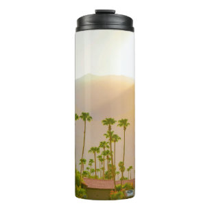 Palm Springs sunset day with mountains and palm tr Thermal Tumbler