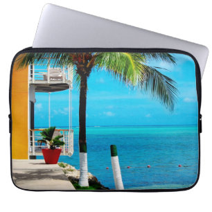 Palm Tree At The Front Yard Of A House By The Sea Laptop Sleeve