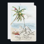 Palm Tree & Beach Chairs Tropical Holiday Card<br><div class="desc">This "Merry Christmas from this side of the world" Christmas holiday card features a palm tree with ornaments and lights, a pair of beach chairs under the umbrella on a sandy beach in watercolor. The reverse side features palm trees and ocean in watercolor. Personalise it for your needs. You can...</div>