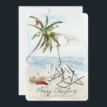 Palm Tree & Beach Chairs Tropical Holiday Card<br><div class="desc">This "Merry Christmas from this side of the world" Christmas holiday card features a palm tree with ornaments and lights, a pair of beach chairs under the umbrella on a sandy beach in watercolor. The reverse side features palm trees and ocean in watercolor. Personalise it for your needs. You can...</div>