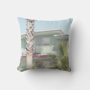 PALM TREE NEAR WHITE CONCRETE HOUSE CUSHION