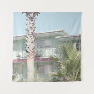 PALM TREE NEAR WHITE CONCRETE HOUSE TAPESTRY