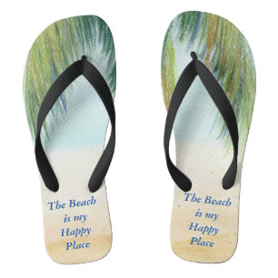 Palm tree on a sunny day on the beach flip flops