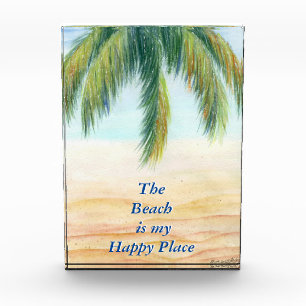 Palm tree on a sunny day on the beach photo block