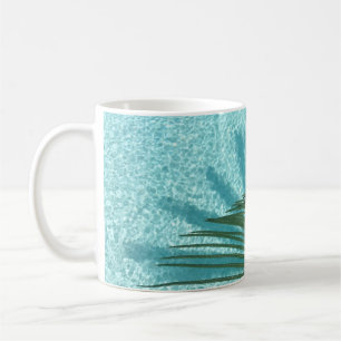 palm tree over the water coffee mug