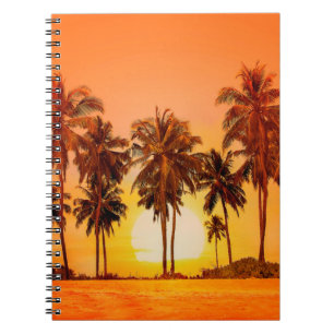 Palm trees at sunset background. Sri Lanka. Notebook