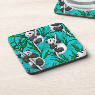 Panda cubs on turquoise coaster