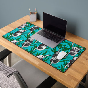Panda cubs on turquoise desk mat