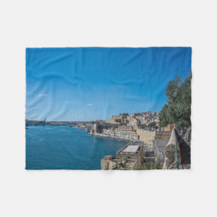 Panoramic view of city wall and harbor in Valletta Fleece Blanket