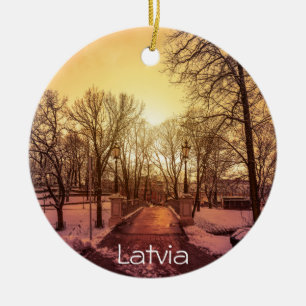 Panoramic view of snowy park during sunset in Riga Ceramic Tree Decoration