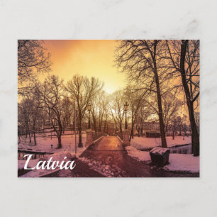 Panoramic view of snowy park during sunset in Riga Postcard