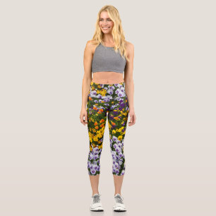 pansies in the garden. Natural image Capri Leggings