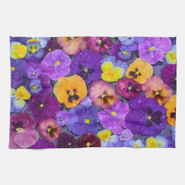 Pansy flowers floating in bird bath with dew tea towel (Horizontal)