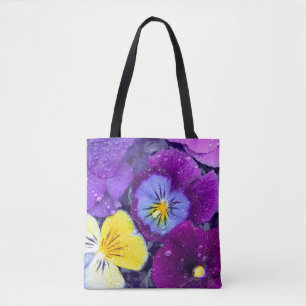 Pansy flowers floating in bird bath with dew tote bag