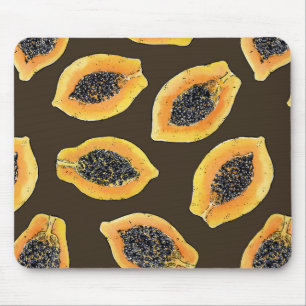 Papaya slices on dark brown mouse mat