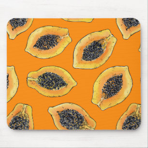 Papaya slices on orange mouse mat