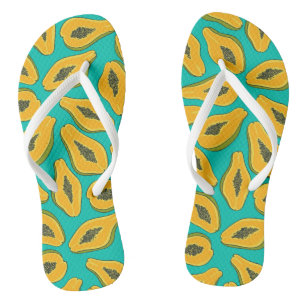Papaya slices on turquoise flip flops