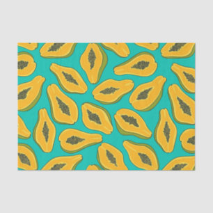 Papaya slices on turquoise tissue paper