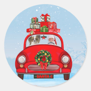 Papillon Dog In Car With Santa Claus Classic Round Sticker