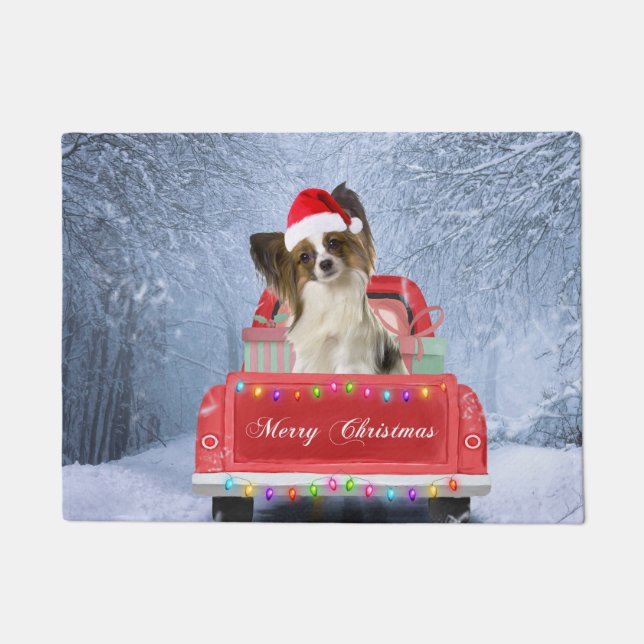 Papillon Dog in Snow sitting in Christmas Truck Doormat (Front)