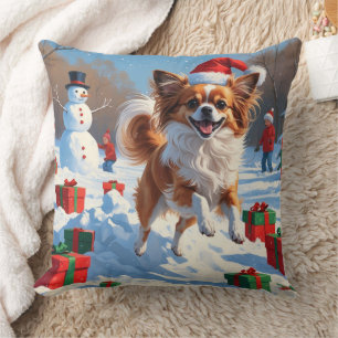 Papillon Dog Running in Snow with Christmas Hat Cushion