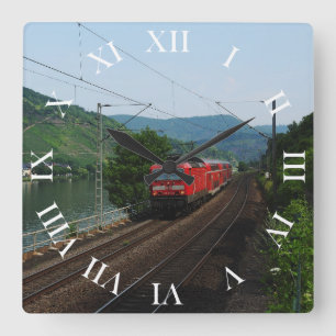 Passenger train in St. Aldegund Square Wall Clock