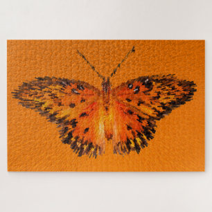 Passion butterfly wings on orange jigsaw puzzle