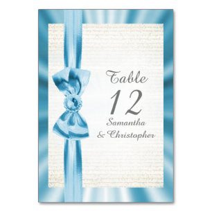 Pastel blue satin ribbon bow wedding table number