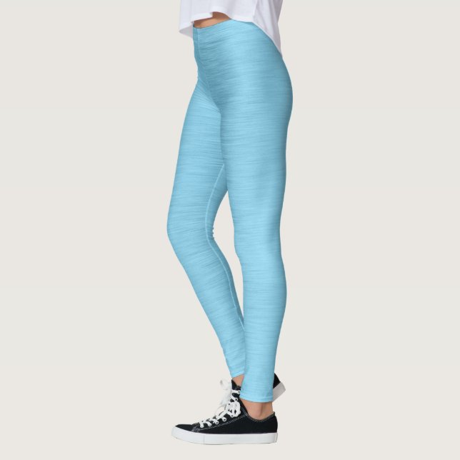 Pastel blue-turquoise metallic-look leggings (Left)