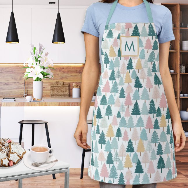 Pastel Christmas Pine Trees Monogrammed Kitchen Apron (A monogrammed kitchen apron with festive Christmas trees pattern in teal, pink, yellow and white)