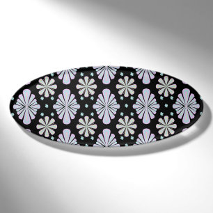 Pastel floral shapes on a black background name tag