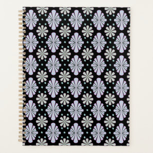 Pastel floral shapes on a black background planner