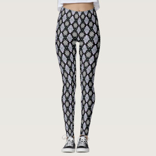 Pastel Floral Shapes on Black Background Leggings