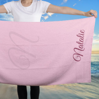 Pastel pink solid colour monogrammed beach towel
