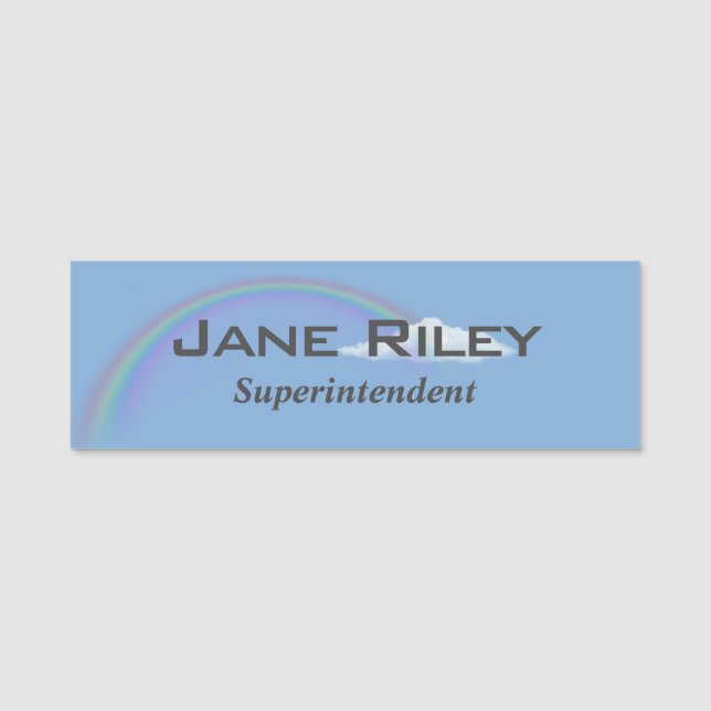 pastel rainbow in cloud on blue name tag (Front)