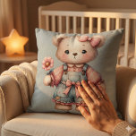 Pastel Teddy Bear Holding Flower Wearing Overalls Cushion<br><div class="desc">This sweet pastel teddy bear design captures a heartwarming, storybook charm with its soft, textured brushwork and cosy vintage aesthetic. Dressed in distressed denim overalls adorned with a pink bow and gingham patchwork, the bear holds a delicate daisy-like flower, radiating innocence and gentle warmth. Large, glossy eyes and blushing cheeks...</div>