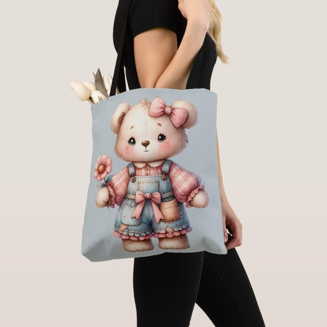 Pastel Teddy Bear Holding Flower Wearing Overalls Tote Bag (Close Up)