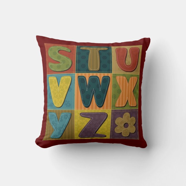 Patchwork Background with Alphabet Pattern Cushion (Front)